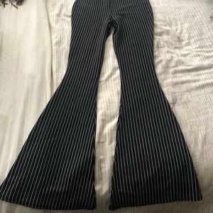 Black and white striped flare pants